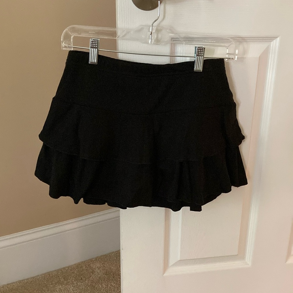 Skirt black size Medium never wore. With tags. Shorts underneath